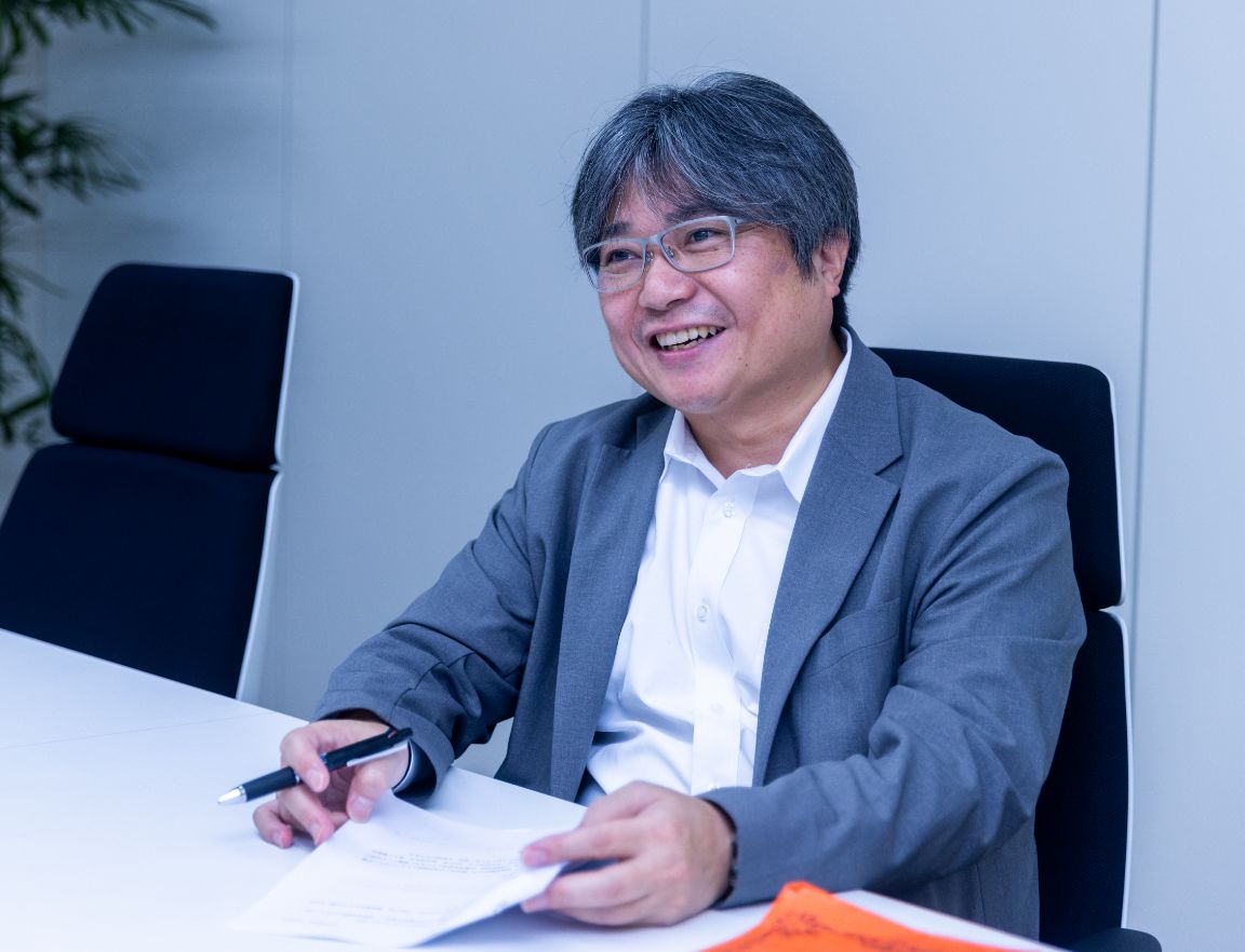 笑顔の常務取締役 髙谷将宏